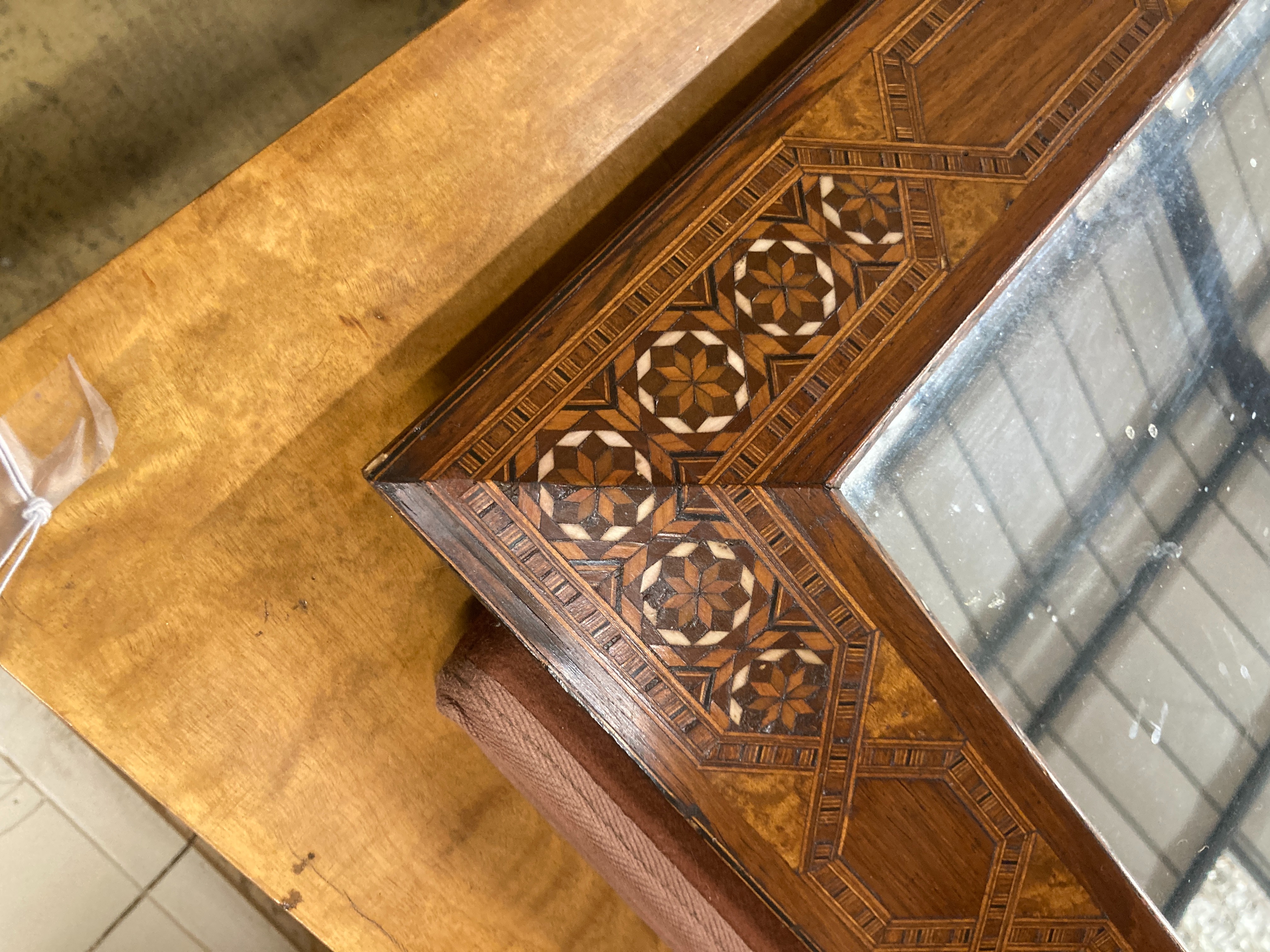 A marquetry mirror, width 46cm, height 59cm